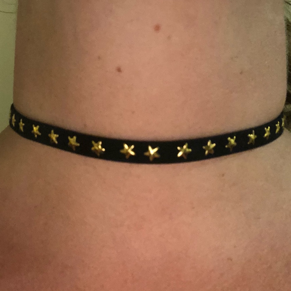 Black choker with gold studded stars